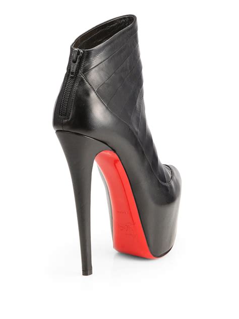 black louboutin heels|louboutin black heel boots.